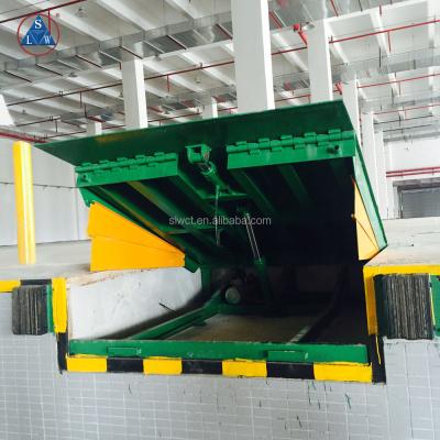 China Electric Building Material Stores 8000kg Warehouse Dock Leveler for sale