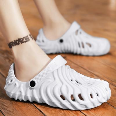 China Summer Women Fashion Beach Slippers Solid Color Round Buckle Decorative Casual Sandals Men's Outdoor Slippers Sandals for sale