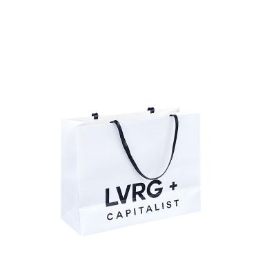China Recycled Materials Custom Printing Classic Boutique Paper Bag Small Cosmetic Jewelry White Kraft Packaging Shopping Bags for sale