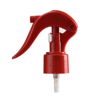 China Color rojo 24/410 Mini pulverizador de disparo de plástico con soporte de diseño de clip de personalización en venta