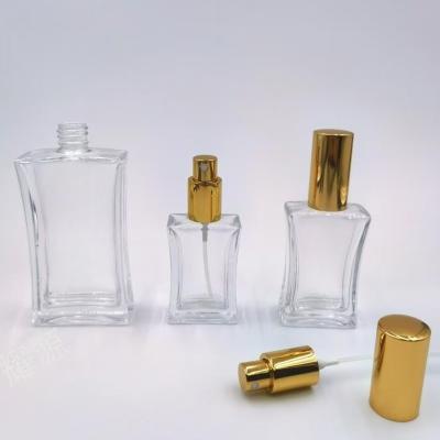 China Customized 20ml 30ml & 50ml Glass Bottle With Aluminum Sprayer and Over Cap for sale