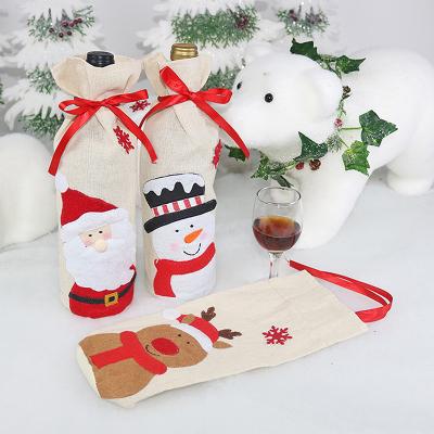 China 2021 New Year Christmas Red Wine Bottle Dust Cover Bag Elk Snowman Red Wine Canvas Bag for Table Decor Christmas Home Decorations for sale
