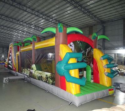 China PVC Tarpaulin Factory Price Dinosaur Jurassic Theme Park Inflatable Obstacle Course With Slide for sale