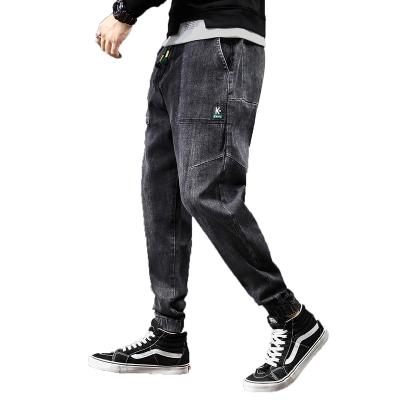 China 2021 New Designs QUICK DRY Pants Drawstring Waist Solid Jeans Gray Harem Plus Size Elasticity Jeans For Men for sale