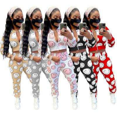 China Breathable Smile Face Pattern Long Sleeve Zipper Two Piece Set Women Tracksuit Sets Two Piece Sport Equipment for sale