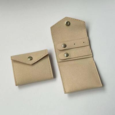 China Mini Beige Travel Jewelry Organizer Soft Microfiber Storage Bag for sale