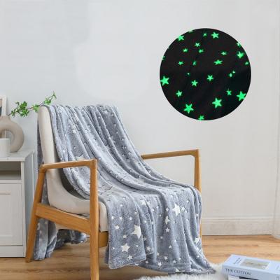 China 100% Polyester Anti-Static Wholesale Spray Fluorescent Glow In The Dark Bright Thin Fleece Flannel Blankets for sale