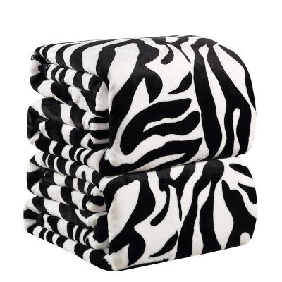 China Custom Sale 100% Polyester Flannel Warm Soft Animal Fleece Blanket Zebra Printing Fleece Blanket For Bed Room Couch And Sofa for sale