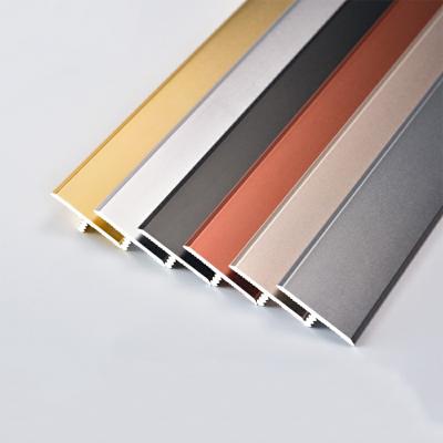 China Modern Aluminum Profile T Shape Tile Trim Gold Floor Transition Strips for sale