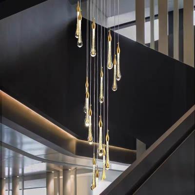 Chine Moderne simple goutte d'eau cristalline Escalier Chandelier 3200-6500K Trois couleurs changent de lumière Pour hôtel Duplex Restaurant Villa à vendre