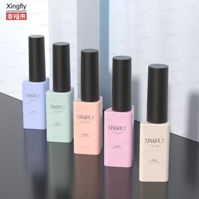 Chine Bouteilles de vernis à ongles UV vides à gros de 12 ml triangle sur mesure avec bouchon de pinceau à vendre