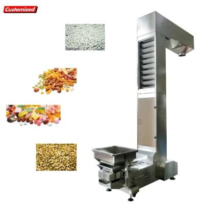 China Política de devolución de 30 días de tipo Z de acero inoxidable de plástico de grano en polvo transportador de salto vertical en venta