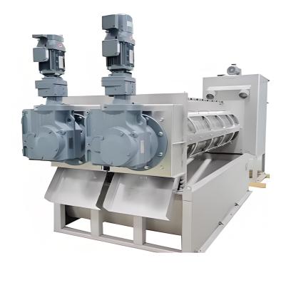China Combinación de una máquina de apilamiento de doble hélice de alta eficiencia y un equipo de deshidratación de lodos para el tratamiento de aguas residuales en venta