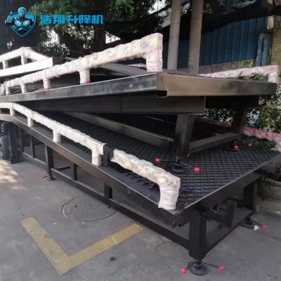 China 10T-10M Customized Black Segmented Portable Loading Docks Hydraulic Dock Ramp for sale