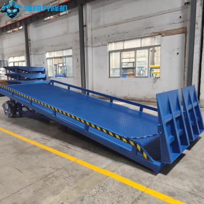 China 10T-10M Customized Blue Loading And Unloading Goods Hydraulic Dock Ramp for sale