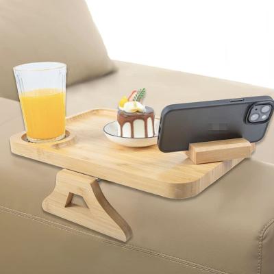 China Sustainable 360 Rotating Adjustable Clip On Wooden Bamboo Eating And Beverage Sofa Arm Tray Portable Stable Couch Table for sale