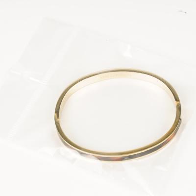 China Custom Knotted Open Bangle Cuff Bracelet Simple Design Stainless Steel Bow Infinity Cuff Bangle Friendly Material For Girls for sale