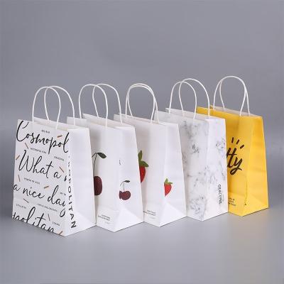 China Reusable flat bottom paper bags christmas paper gift bags paper twist handle bags for sale