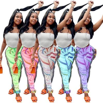 China Anti-wrinkle Oulaiyadi Ladies Fashion XXL Plus Size Casual Sports Tassel Pant Print Fringe Women Pants Trousers for sale