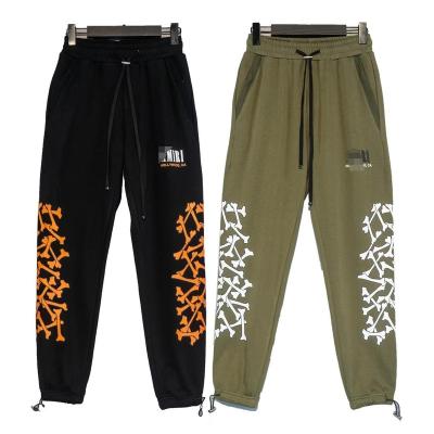 China 100% Cotton Fashion Trend Brand Street Style Bone Printing High Street Pants Loose Casual Pants for sale