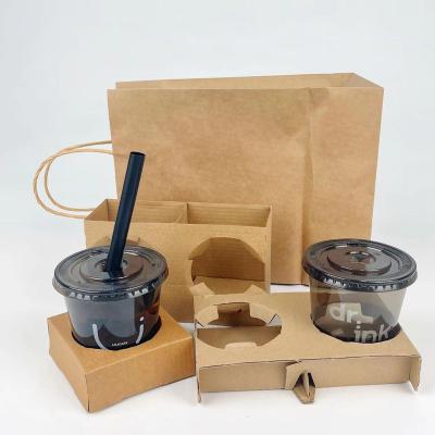 China Biodegradable Hot Sales Cup Holder Disposable Hot Cold Drink Coffee 2/4 Carrier Take Out Kraft Paperboard Holder for sale