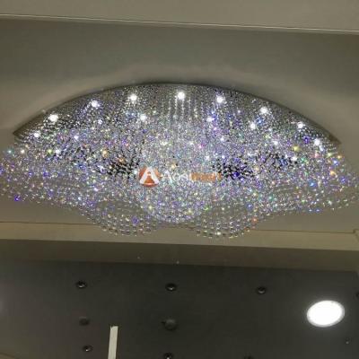 China A modern bead curtain surrounds a large sparkling Crystal Ball for sale