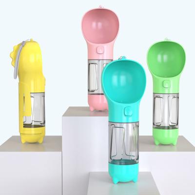 China New Sustainable Wholesale Plastic 4 in 1 Portable Travel Dog Drinking Water Food Bottle with Poop Bag for sale