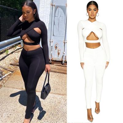 China Longsleeve Crop Women Top Clothing Pants Solid Out Two Piece Set Sustainable Hollow for sale