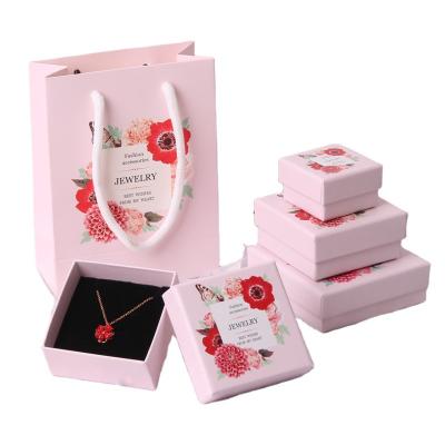 China Handmade Cardboard Jewelry Packaging Pink Gift Paper Box With Foam for sale