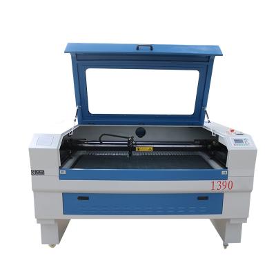 China Laser Engraving Mobile Screen Protector Laser Cutting Machine CO2 Laser Cutting Machine For MDF Copper for sale