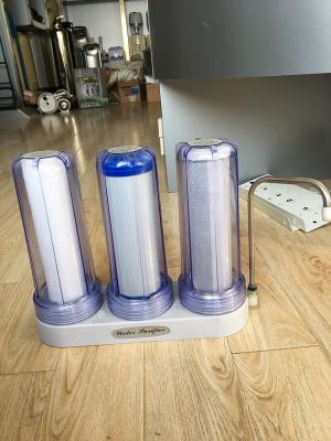 China La encimera alcalina PP de la filtración del triple del filtro de agua del Ro de la vivienda clara activó el carbono de cerámica en venta