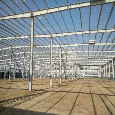 China Wide Span Steel Frame Building Construction Prefab Metal Storage Buildings for sale