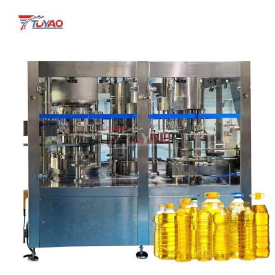 China Food Fully automatic weighing type oil liquid filling machine olive edible cooking oil liquid filling machine manufacturer for sale