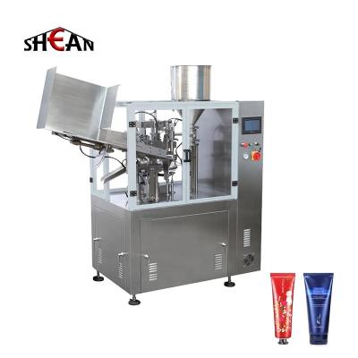 China Food Automatic Small Plastic Toothpaste Cosmetic Cream Lipgloss Honey Dressing Soft Tube Filling and Sealing Machine for sale