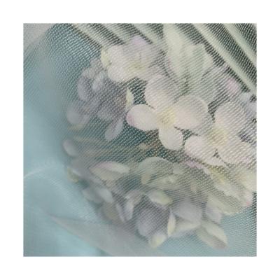 China Wholesale 100% Mesh Lace Fabric Mini Dot Pattern In Plain Tulle Memory Textile Warp Polyester Fabric For Dress for sale