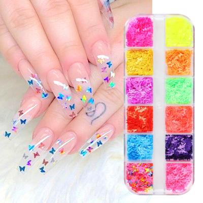 China Fashionable 3D Utralthin 12 Grids Fluorescence Butterfly Sequins Glitter Slice Nail Art Decoration Kit for sale
