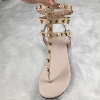 China Wholesale Rivet Women's Fashion Trend Sandals Summer Flat Heels Trend for sale