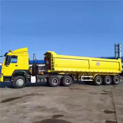 China CIMC 3 Axles 60 Ton Hydraulic Dumper Semi Truck Transport Sand Stone Cargo Trailer Side Tipper Dump Semi-Trailer for sale