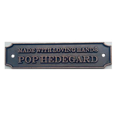 China Sustainable Oil Covered Pad OEM Gold Custom Logo Emboss Metal Tags Bag Label for sale
