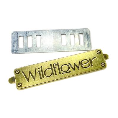 China Durable Zinc Alloy Metal Round Logo Stamp Customized Label Sewing Tag For Garment for sale