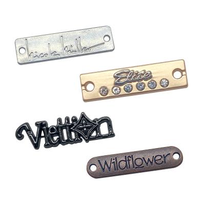 China Sustainable Fashion Clothes Accessory Manufacturer Custom Letter Logo Engraved Metal Labels For Swimwear for sale