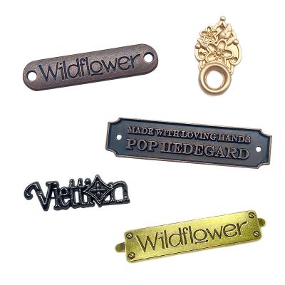 China Custom Sewing Silver Color 3D Letter Label Brand Name Metal Sewing Tags Workable For Clothes for sale