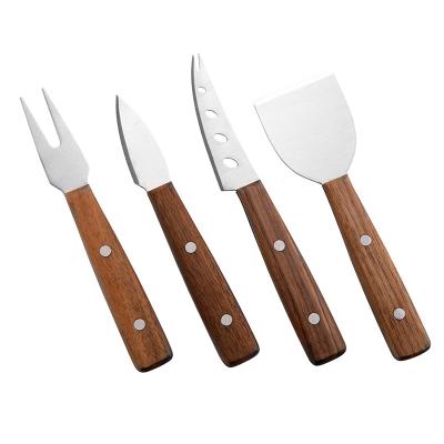 China Sustainable Fashion PP Bag Cheese Tools Laser Wood 4 Pieces Cheese Knife Set Set for sale