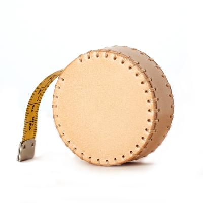 China Mini Handmade Genuine Leather Retractable Soft Custom Meter Round Tape Measure for sale