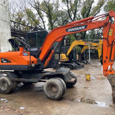 China Original 6 Ton Small Tire Second Hand Excavator Sold At A Low Price For Doushan DX60W Wheeled Excavator 1.9m ³ for sale