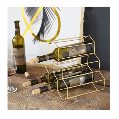 China Minimalist Home Decor Gold Racks Metal Wine Glass Bottle Holders for sale