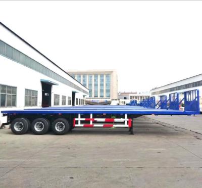 China Truck Trailer 4 Axles Flat Bed Trailer 20Ft Flat Bed Semi Trailer 40Ft Flat Bed Trailer For Sale for sale