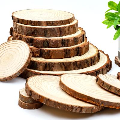 China Christmas Ornaments 8-35cm Thicken Natural Pine Log Cuts Unfinished Sliced Circles With Tree Bark Log Discs DIY Craft Christmas Festive Painting for sale