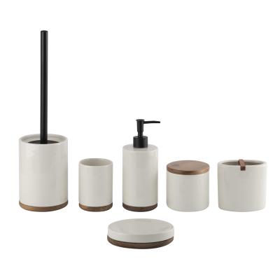 China Round shape ceramic bathrooom accessories with wooden base cream color ceramic soap dispenser for sale