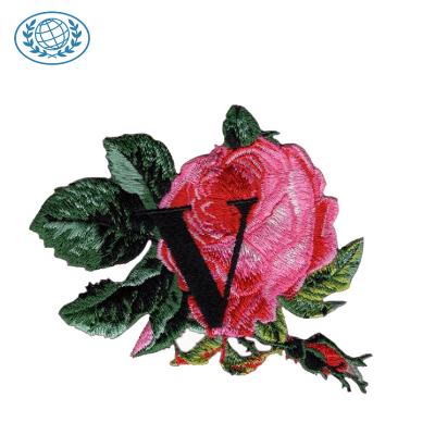 China Viable Custom Flower Embroidered Patches Beautiful Little Flower Embroidery Patch for sale